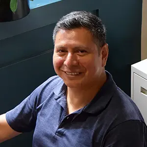 Carlos at Optima's Toronto office, 2023